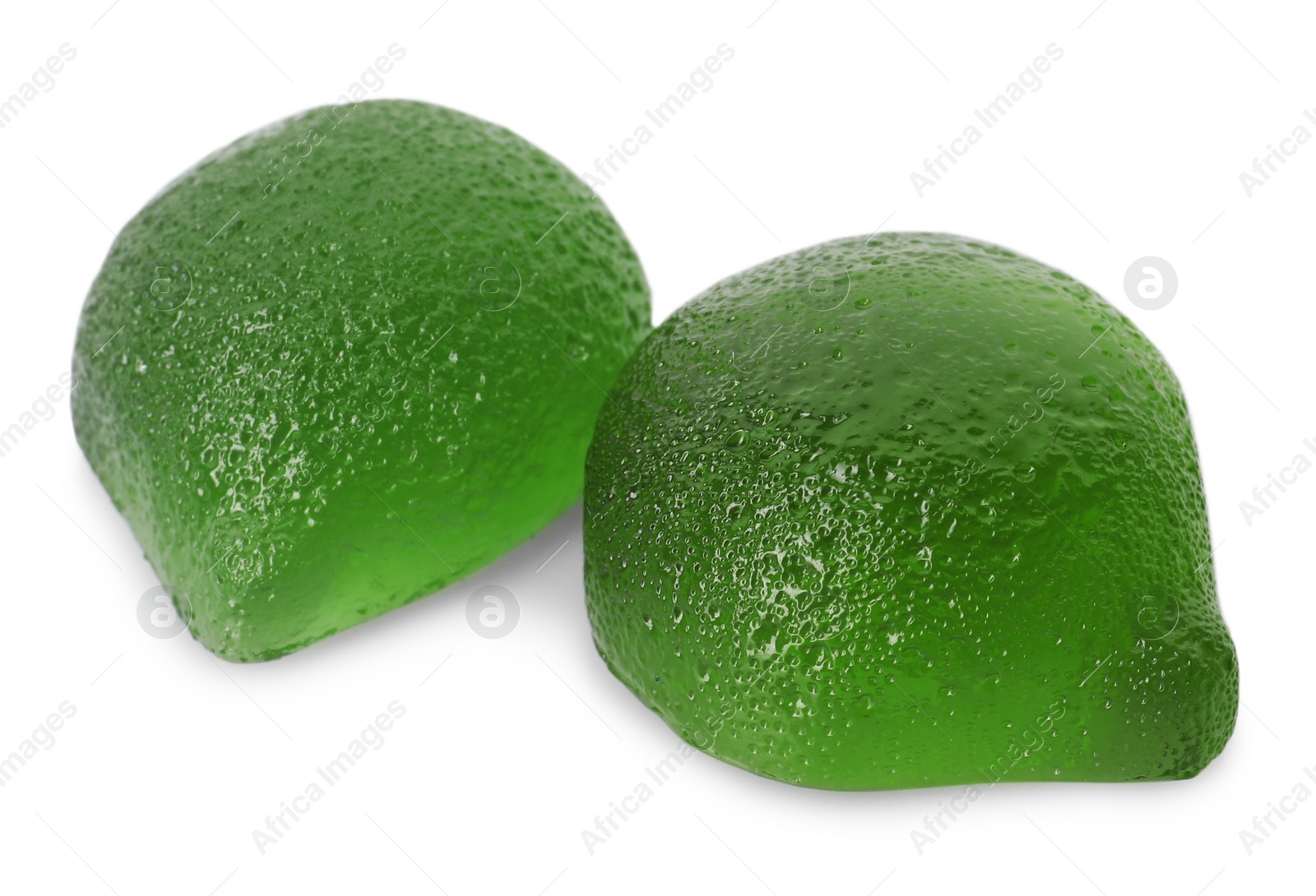 Photo of Delicious gummy lime candies on white background