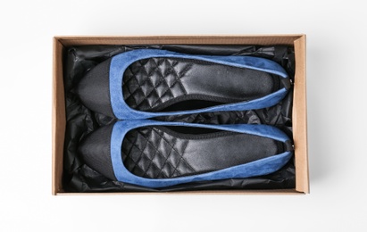 Photo of Pair of female shoes in box on white background, top view