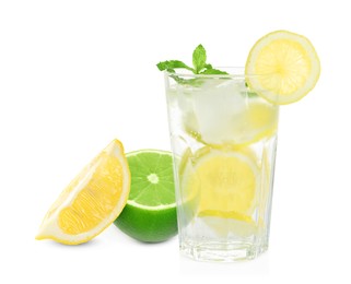 Glass with tasty lemonade and fresh ripe citrus fruits on white background