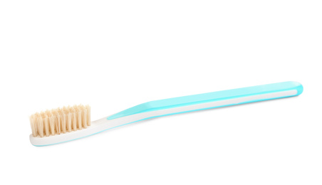 Photo of Natural bristle toothbrush with blue handle isolated on white