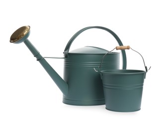 Photo of Watering can and bucket on white background