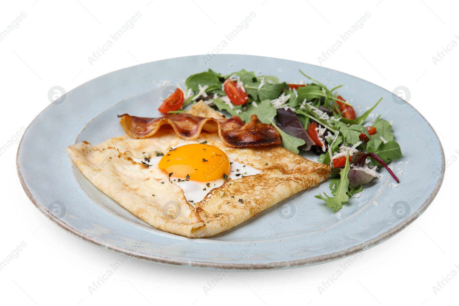 Photo of Delicious crepe with egg isolated on white. Breton galette