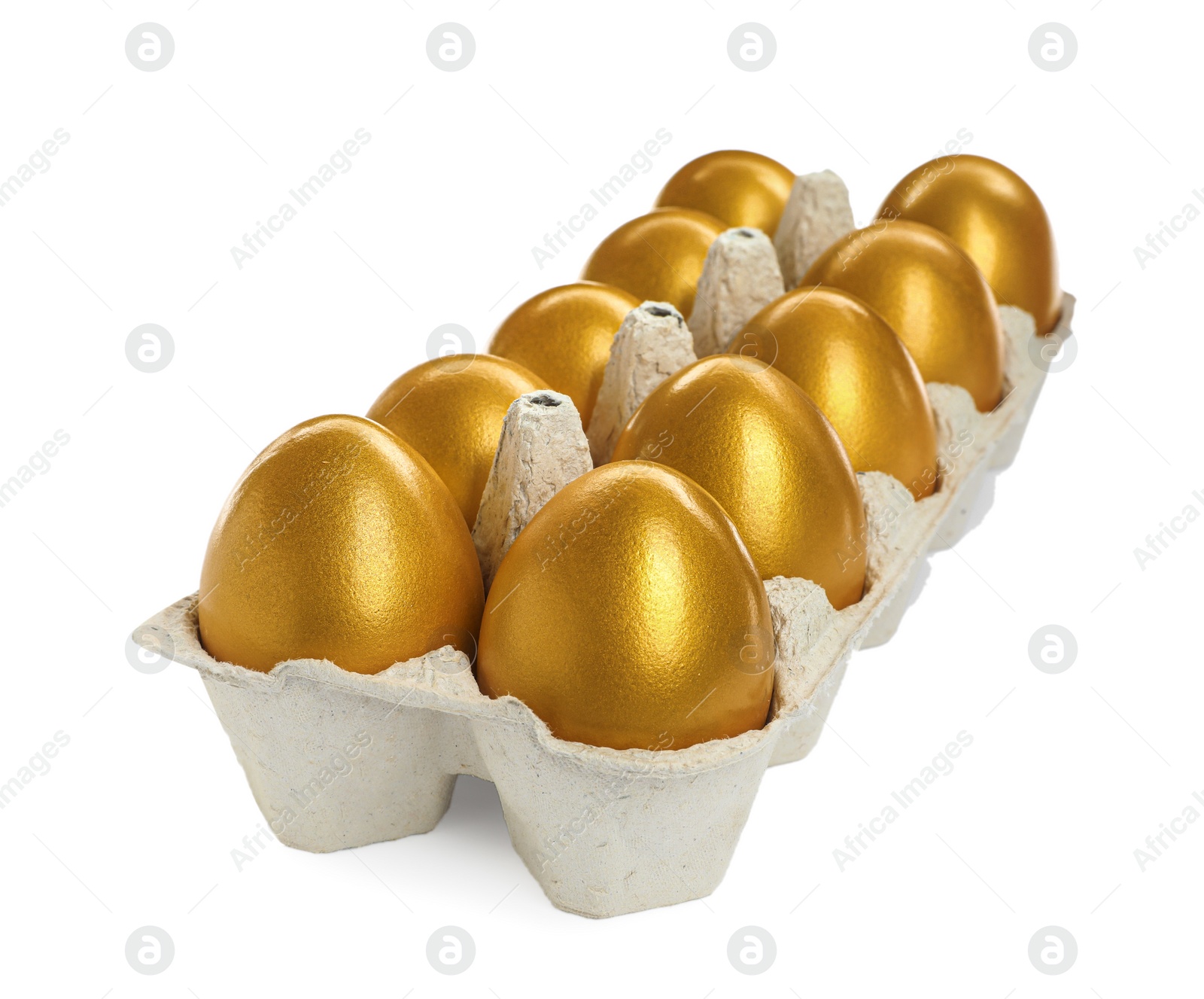 Photo of Many shiny golden eggs in carton on white background