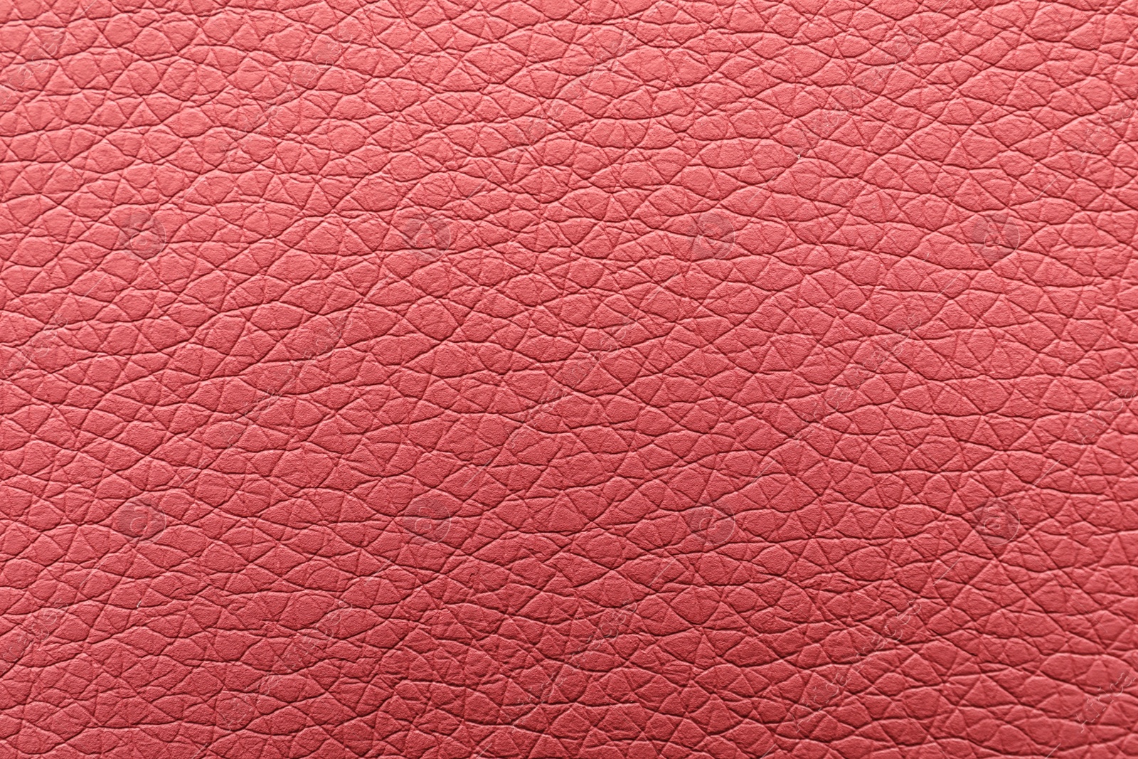 Photo of Texture of pink leather as background, closeup