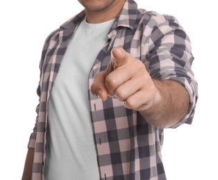 Man touching something on white background, closeup. Finger gesture