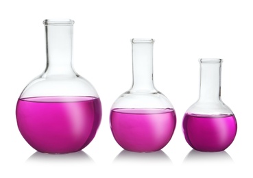 Photo of Florence flasks with purple liquid on white background