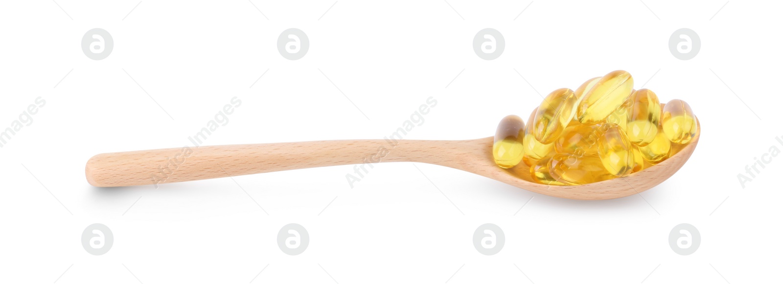 Photo of Vitamin capsules in wooden spoon isolated on white