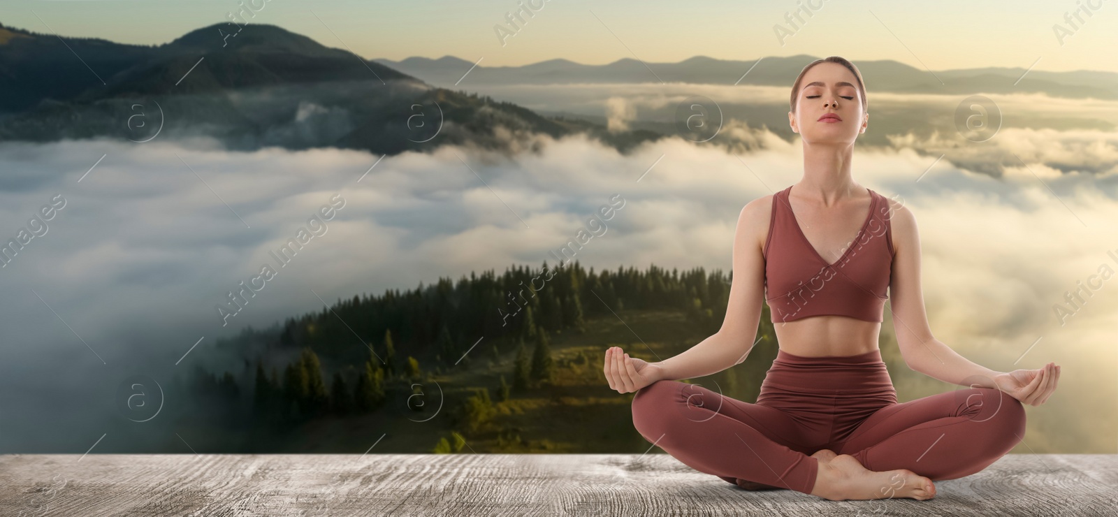 Image of Young woman practicing yoga on wooden surface against beautiful mountain landscape, space for text. Banner design