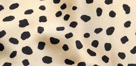 Texture of polka dot fabric as background, top view