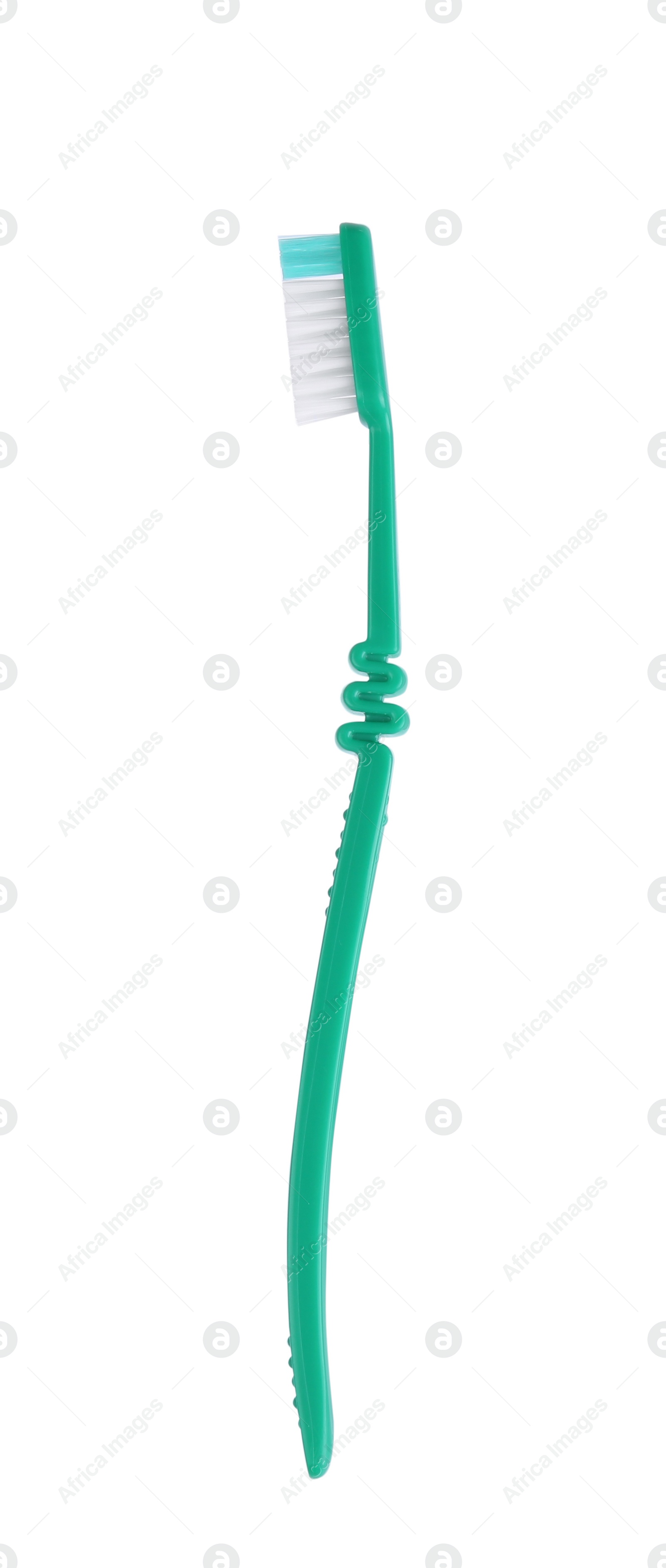 Photo of Green plastic toothbrush isolated on white. Dental care