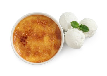Delicious creme brulee and scoops of ice cream on white background, top view