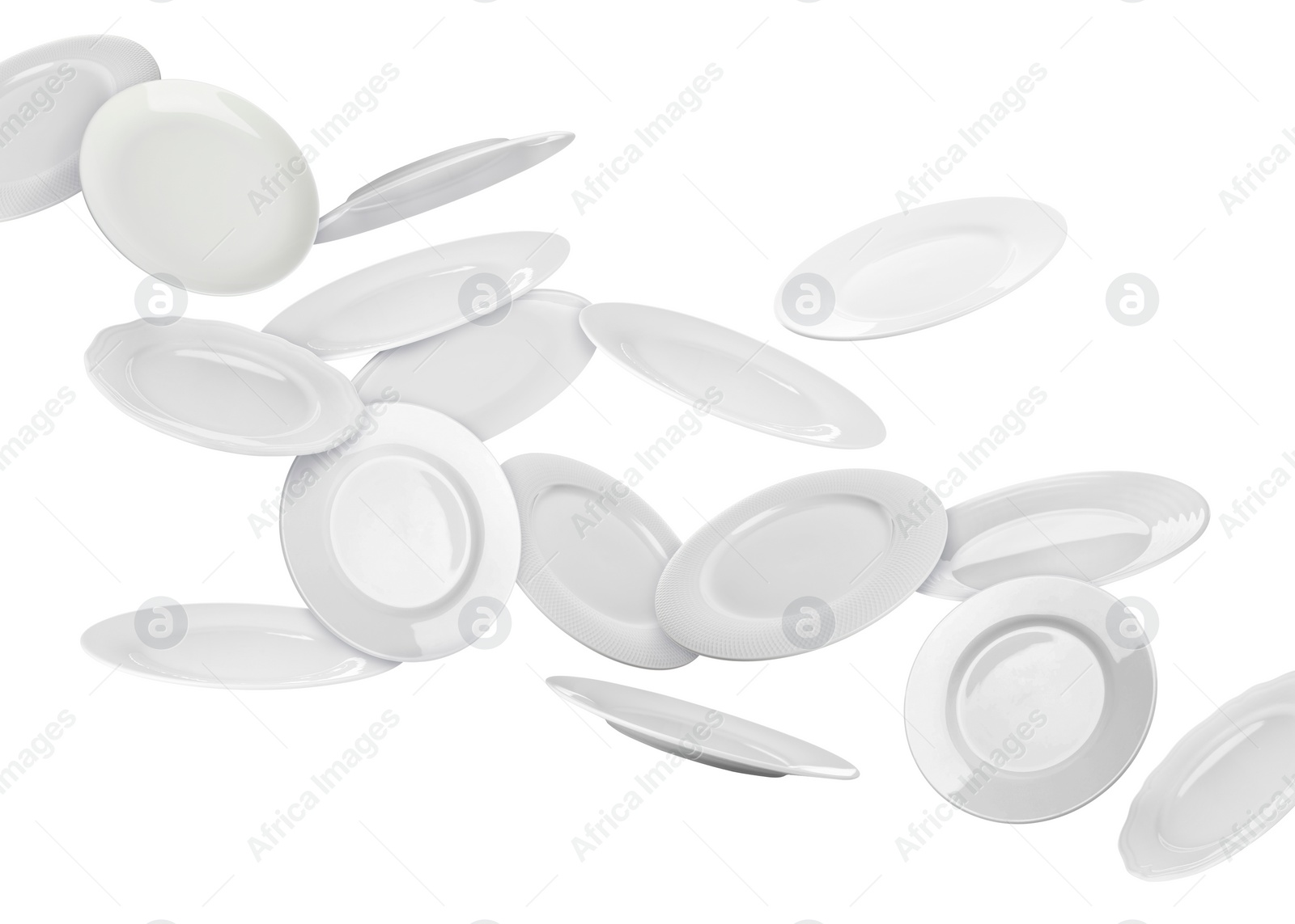 Image of Many ceramic plates falling on white background