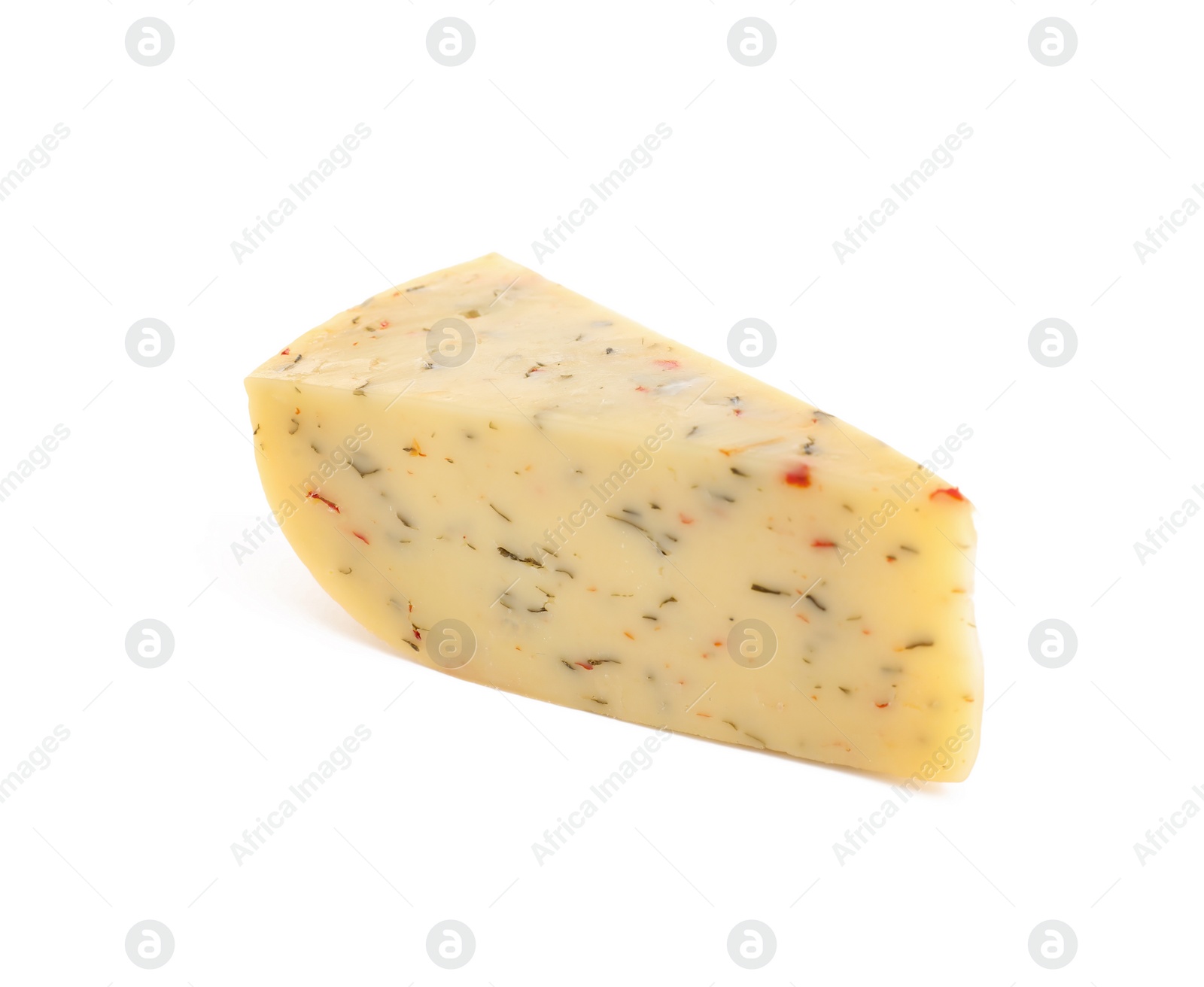 Photo of Piece of tasty cheese with basil and paprika isolated on white