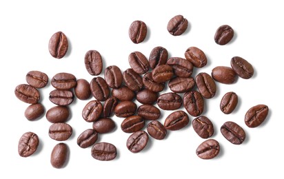 Photo of Many roasted coffee beans isolated on white, top view