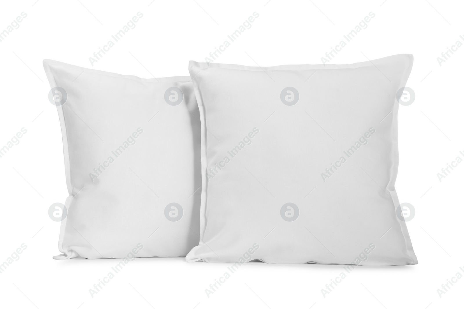 Photo of Two new soft pillows isolated on white