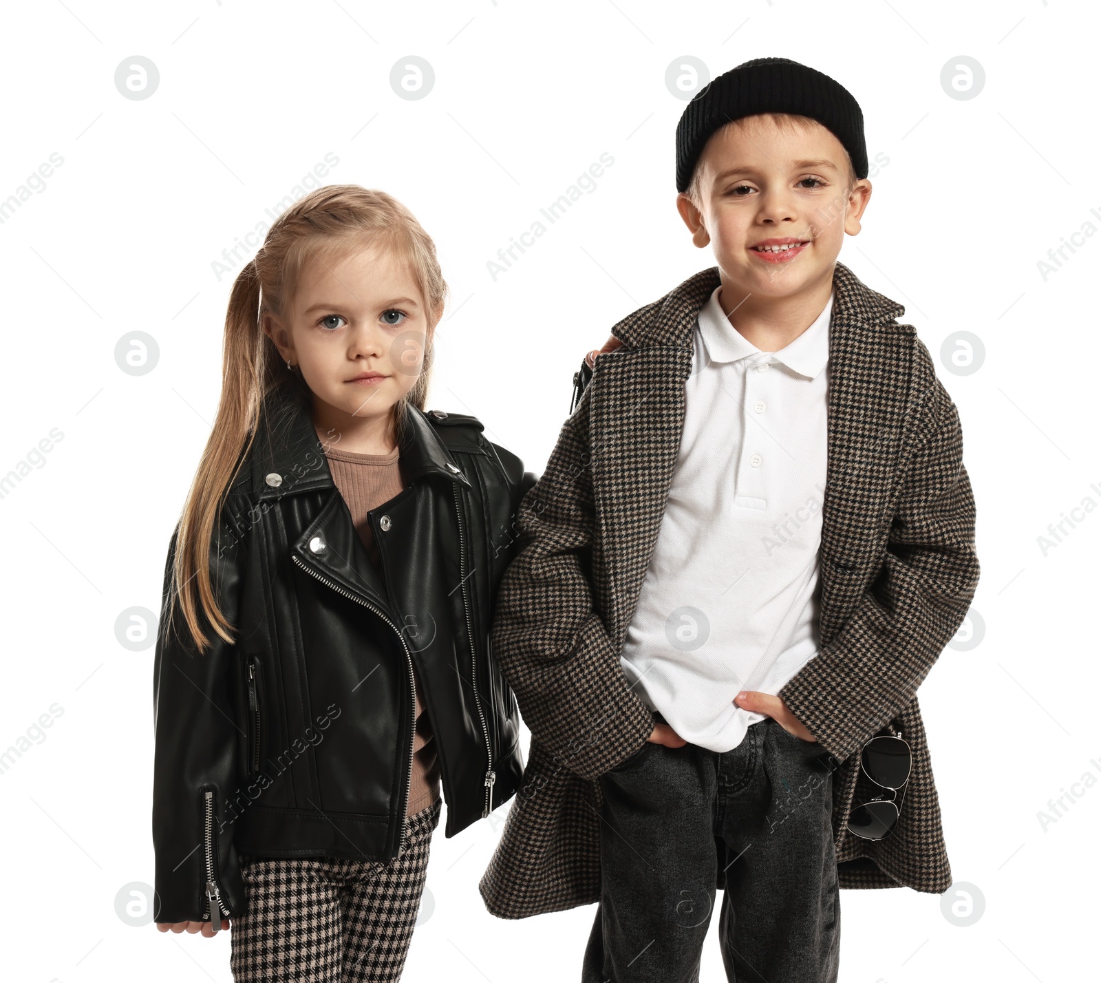 Photo of Fashion concept. Stylish children posing on white background