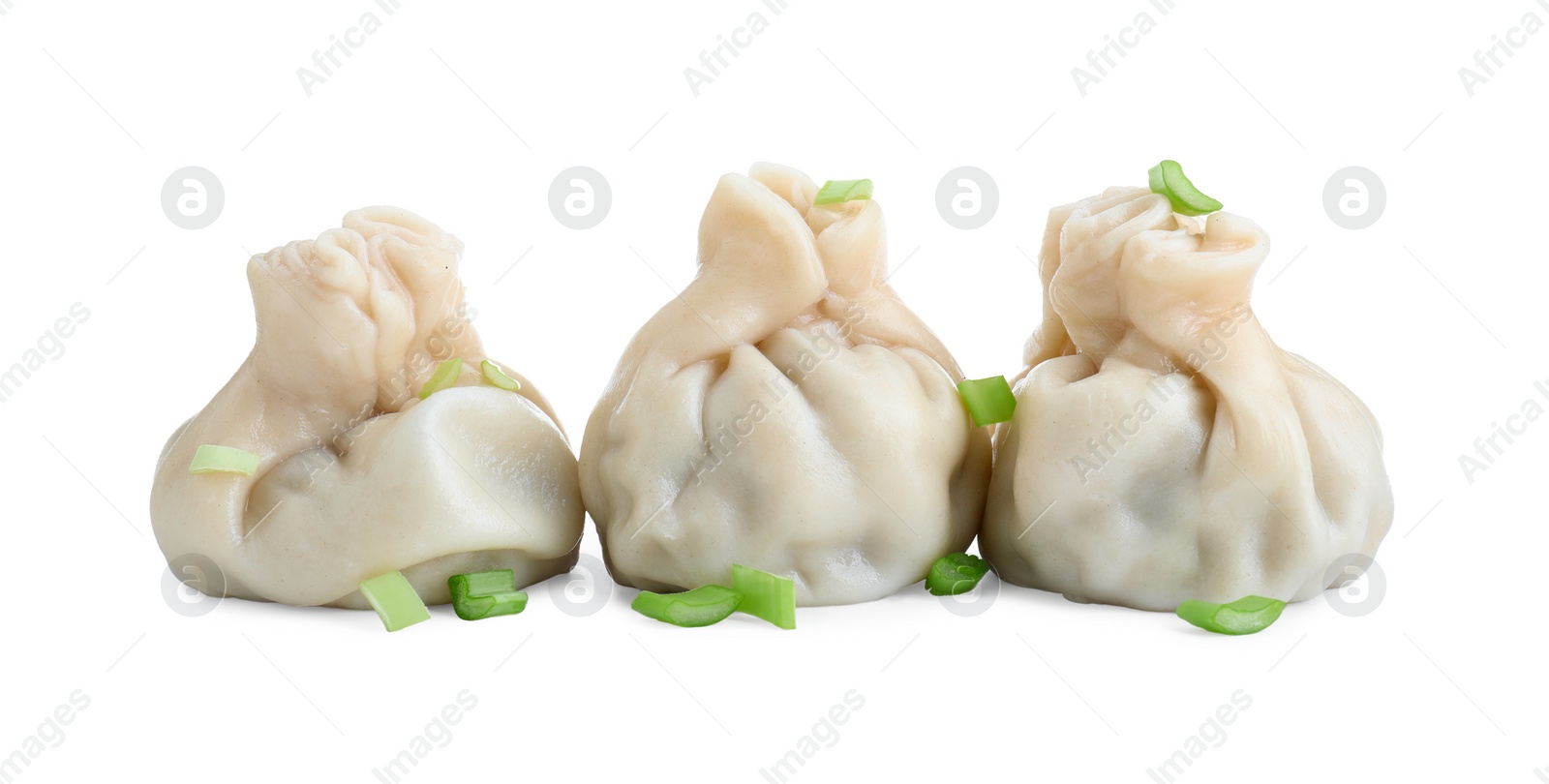 Photo of Three tasty khinkali (dumplings) and onion isolated on white. Georgian cuisine