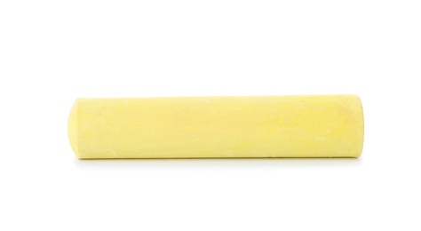 Photo of Yellow piece of chalk on white background