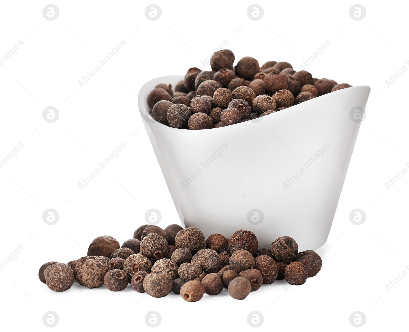 Photo of Black pepper in bowl isolated on white