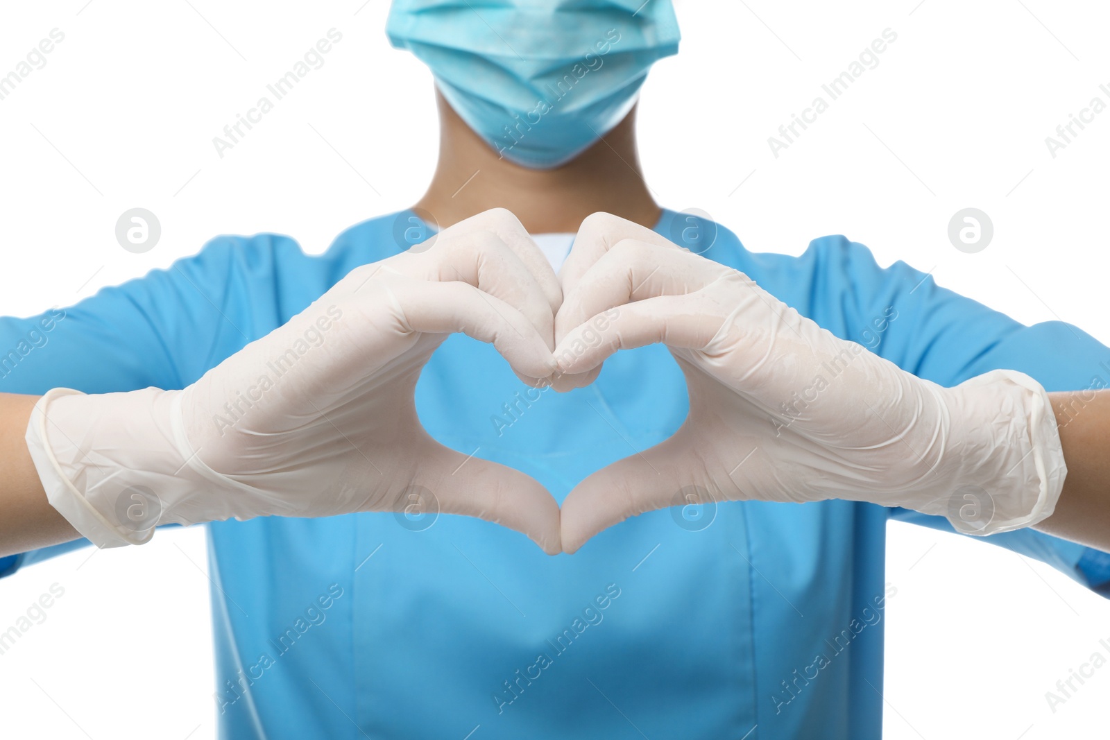 Photo of Doctor in medical gloves showing heart gesture on white background, closeup
