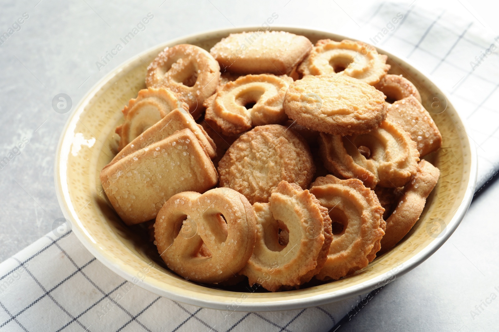 Photo of Bowl with Danish butter cookies on table, closeup