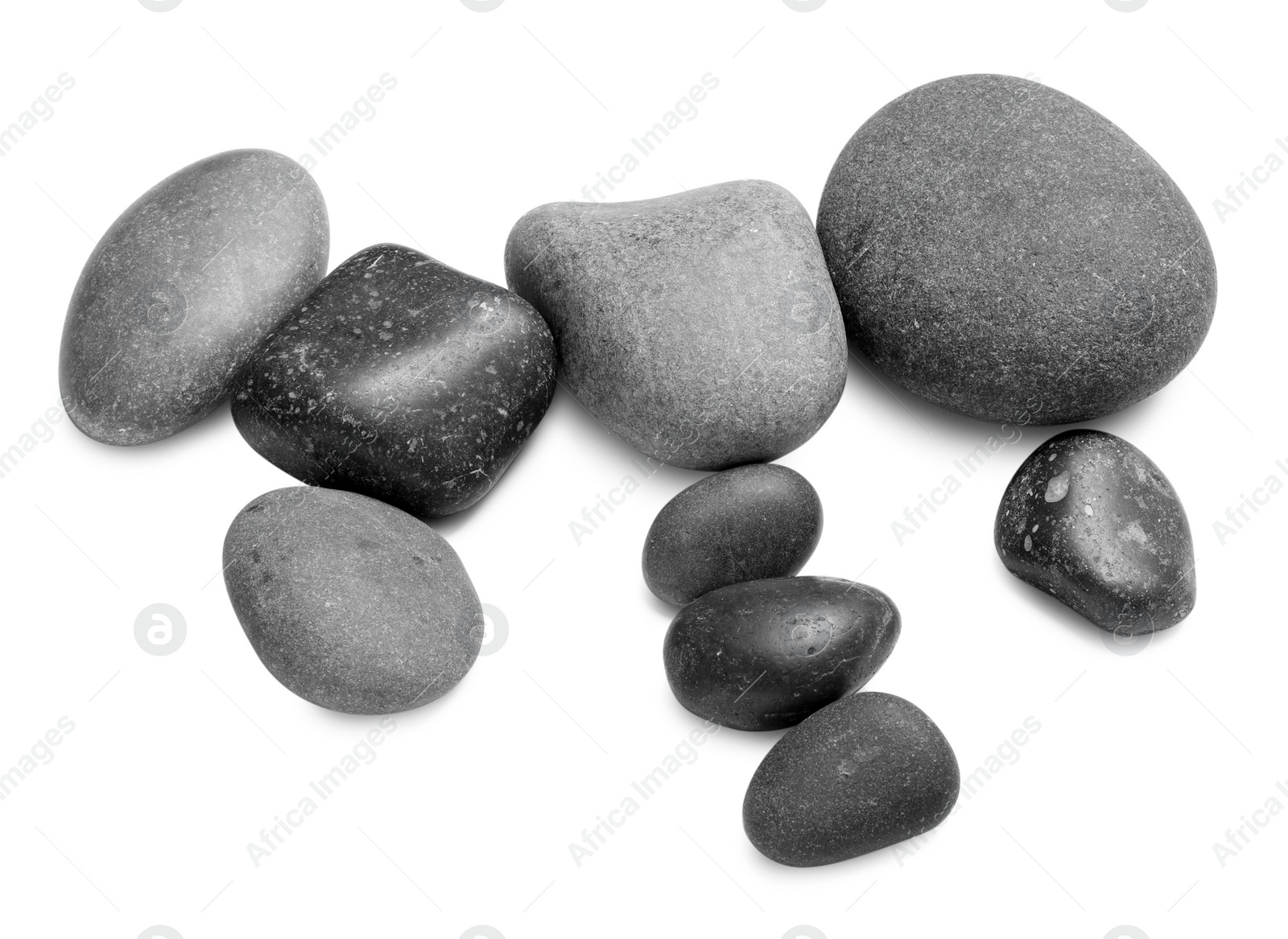 Photo of Group of different stones on white background, above view