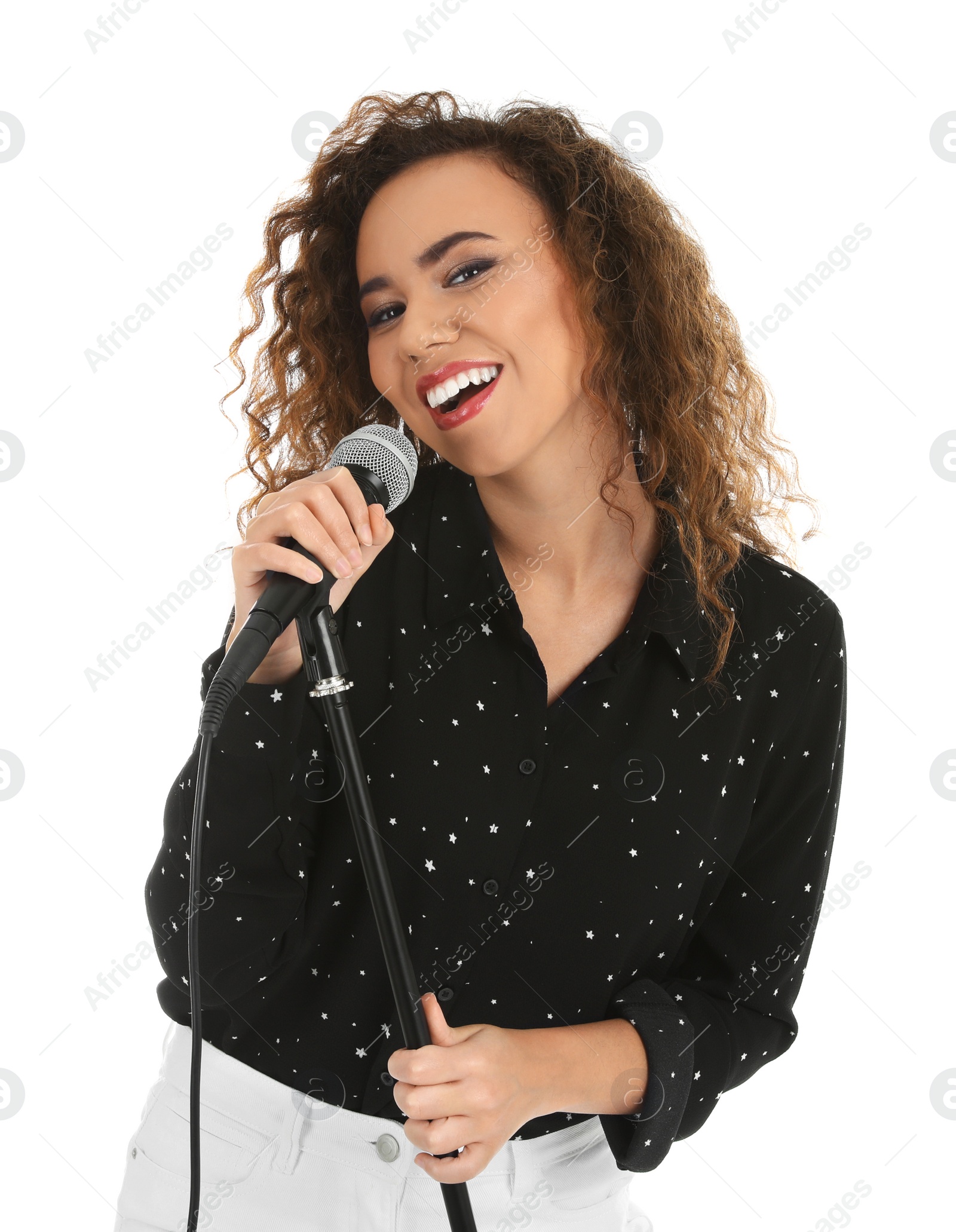 Photo of Curly African-American woman posing with microphone on white background