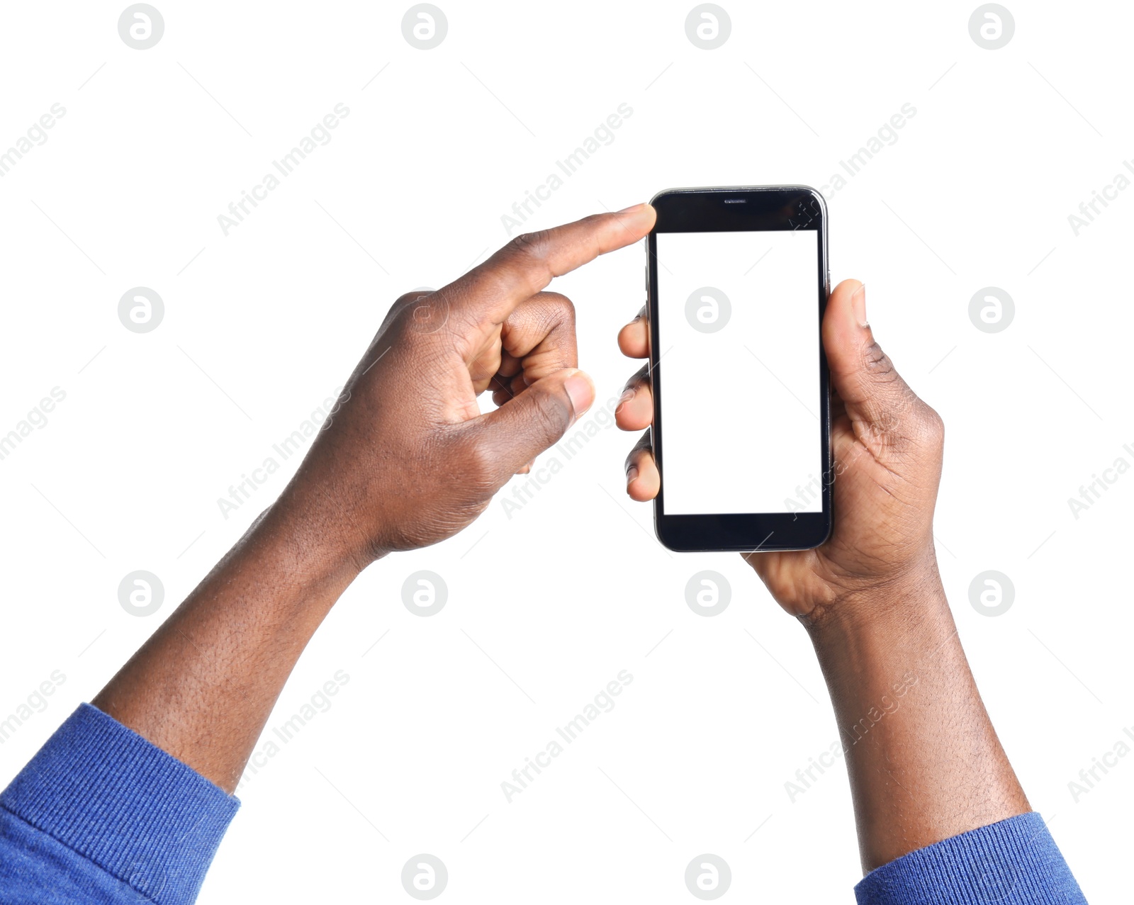 Photo of African-American man holding mobile phone with blank screen in hands on white background