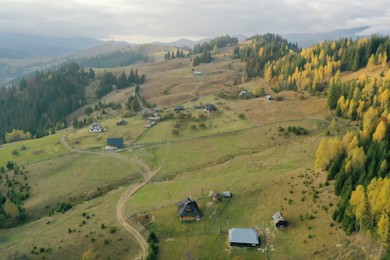 Aerial view of beautiful mountain village on sunny day