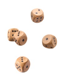 Five wooden dice in air on white background