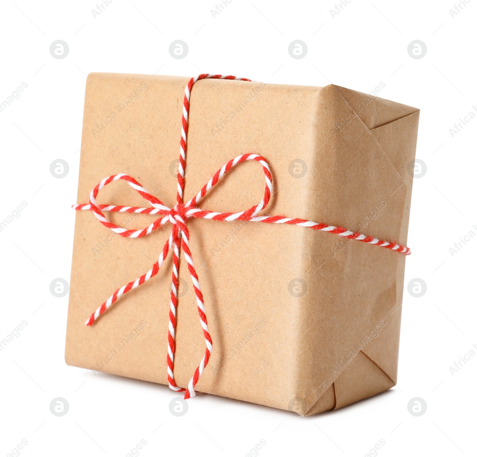 Photo of Gift box wrapped in kraft paper with bow isolated on white