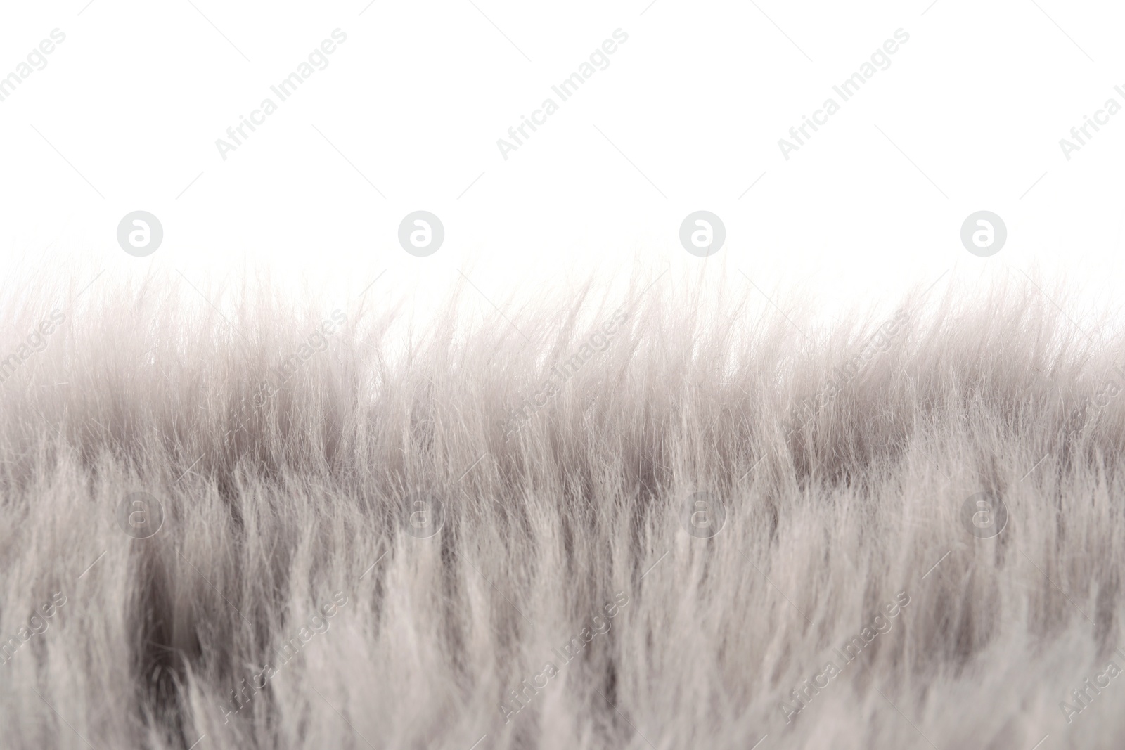 Photo of Soft grey faux fur isolated on white