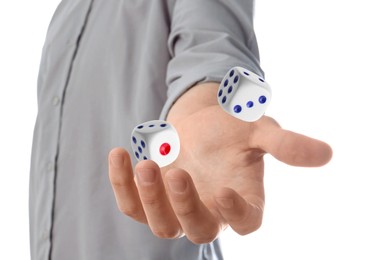 Image of Man throwing dice on white background, closeup