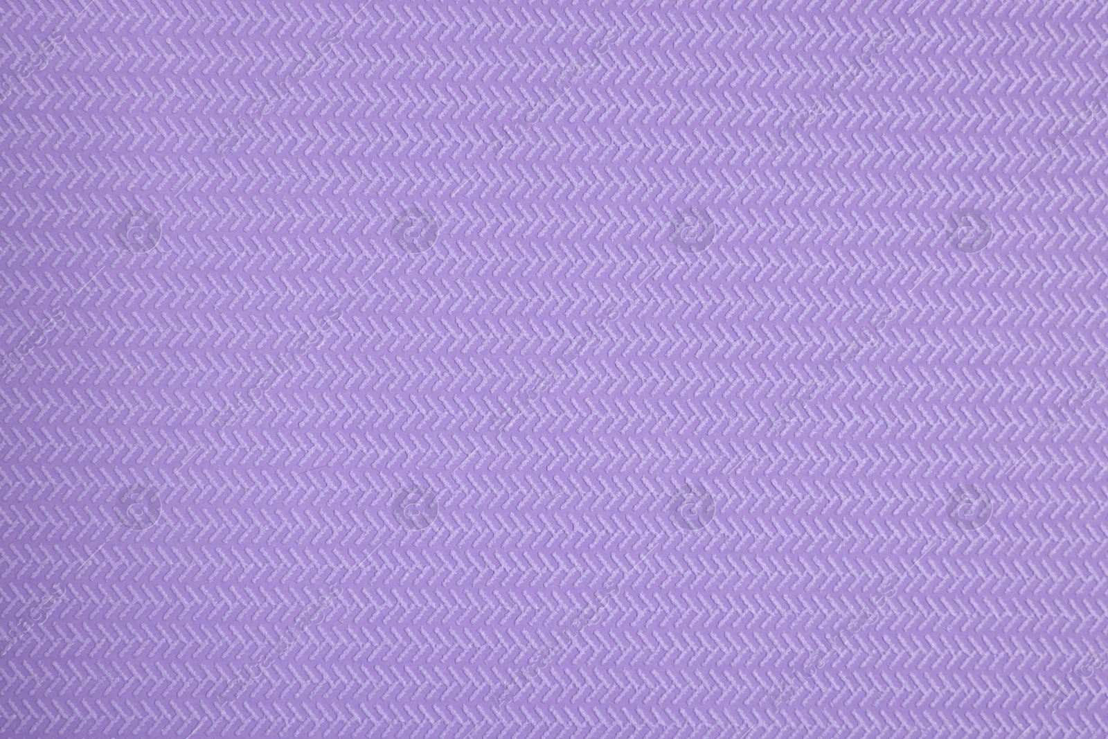 Photo of Stylish violet wallpaper as background, closeup view