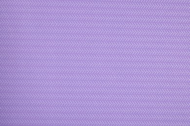 Photo of Stylish violet wallpaper as background, closeup view