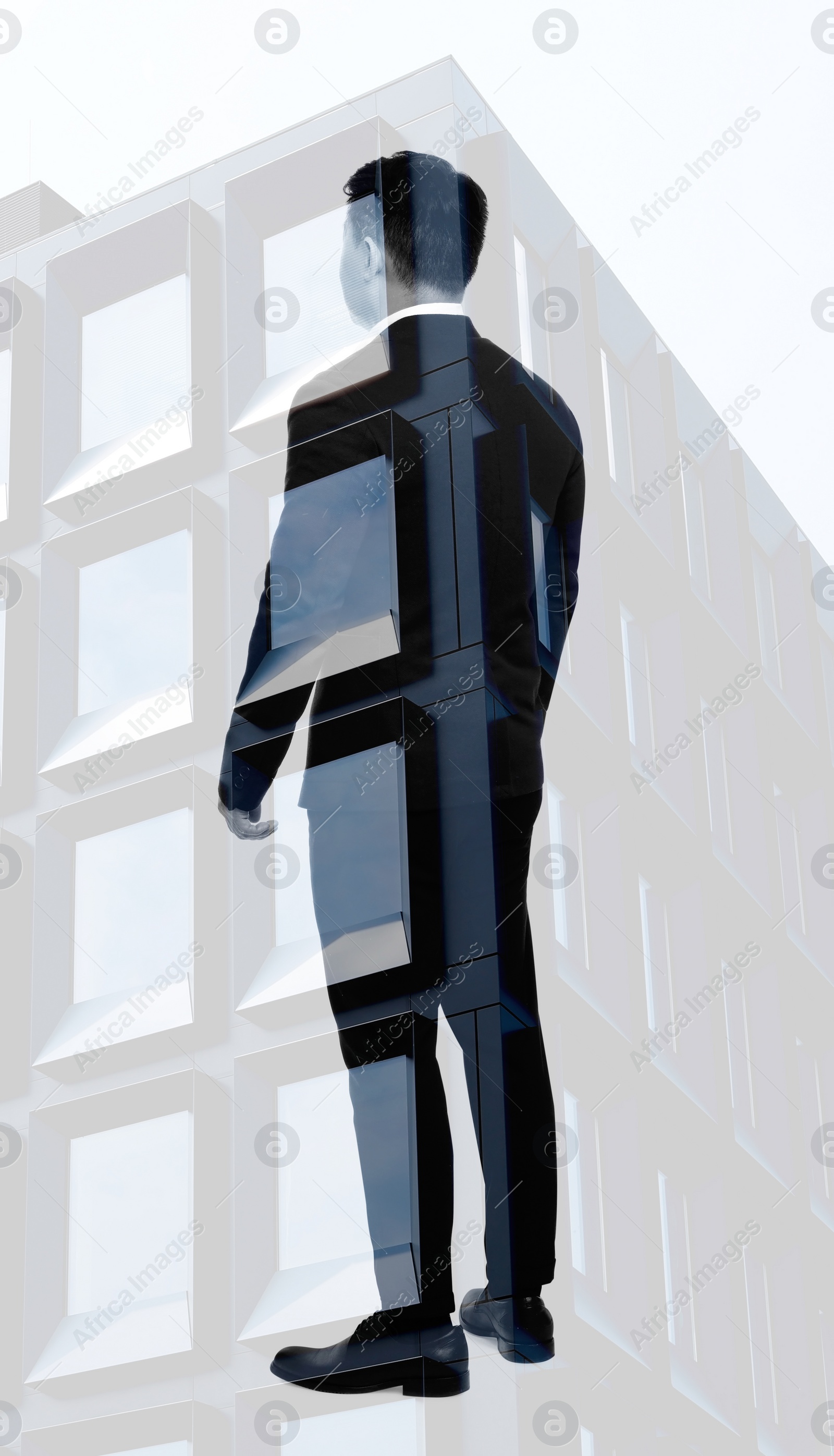 Image of Double exposure of businessman and office building