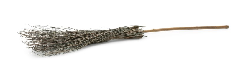 Photo of Old broom with wooden handle isolated on white