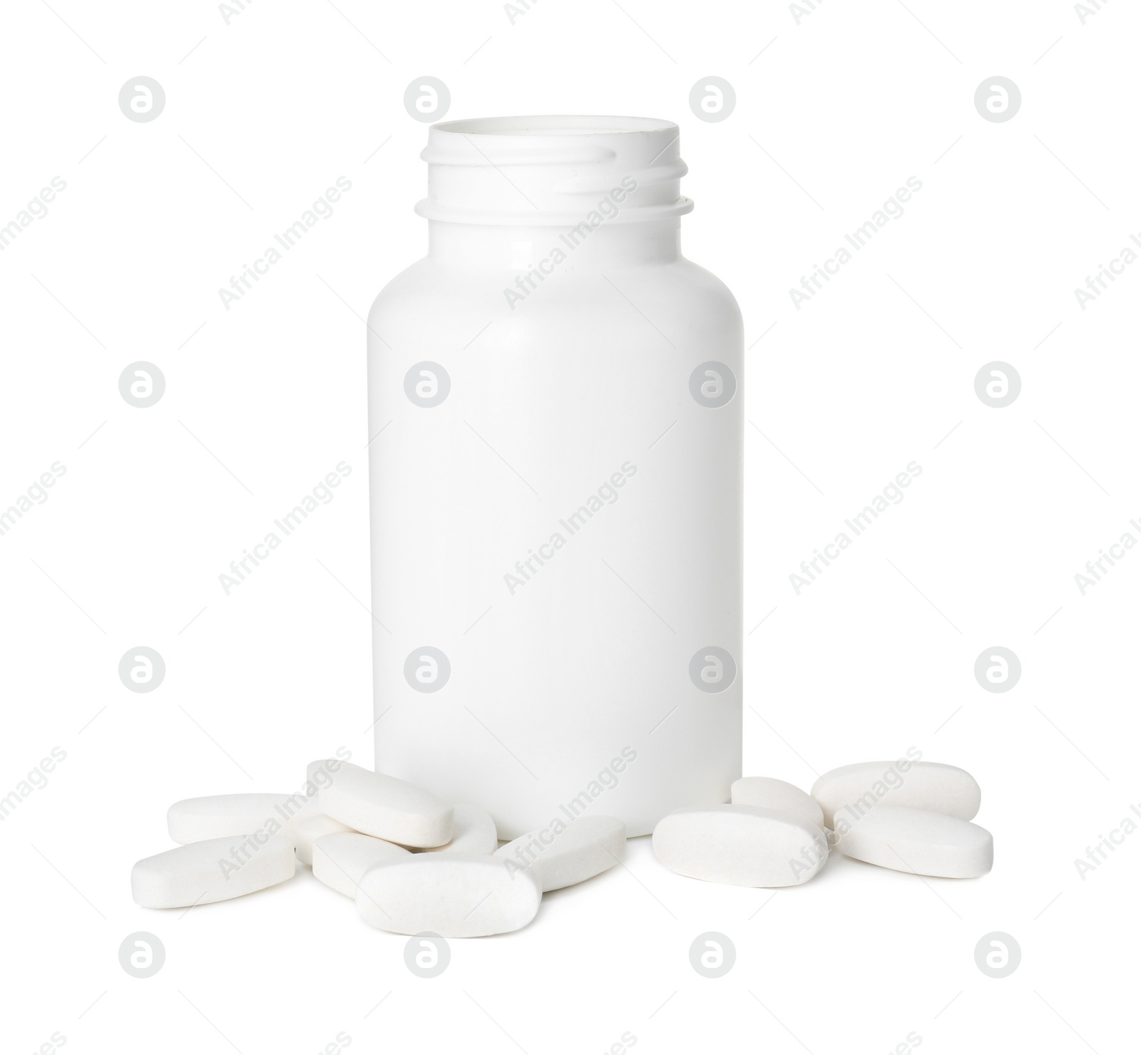 Photo of Bottle and pile of vitamin pills isolated on white