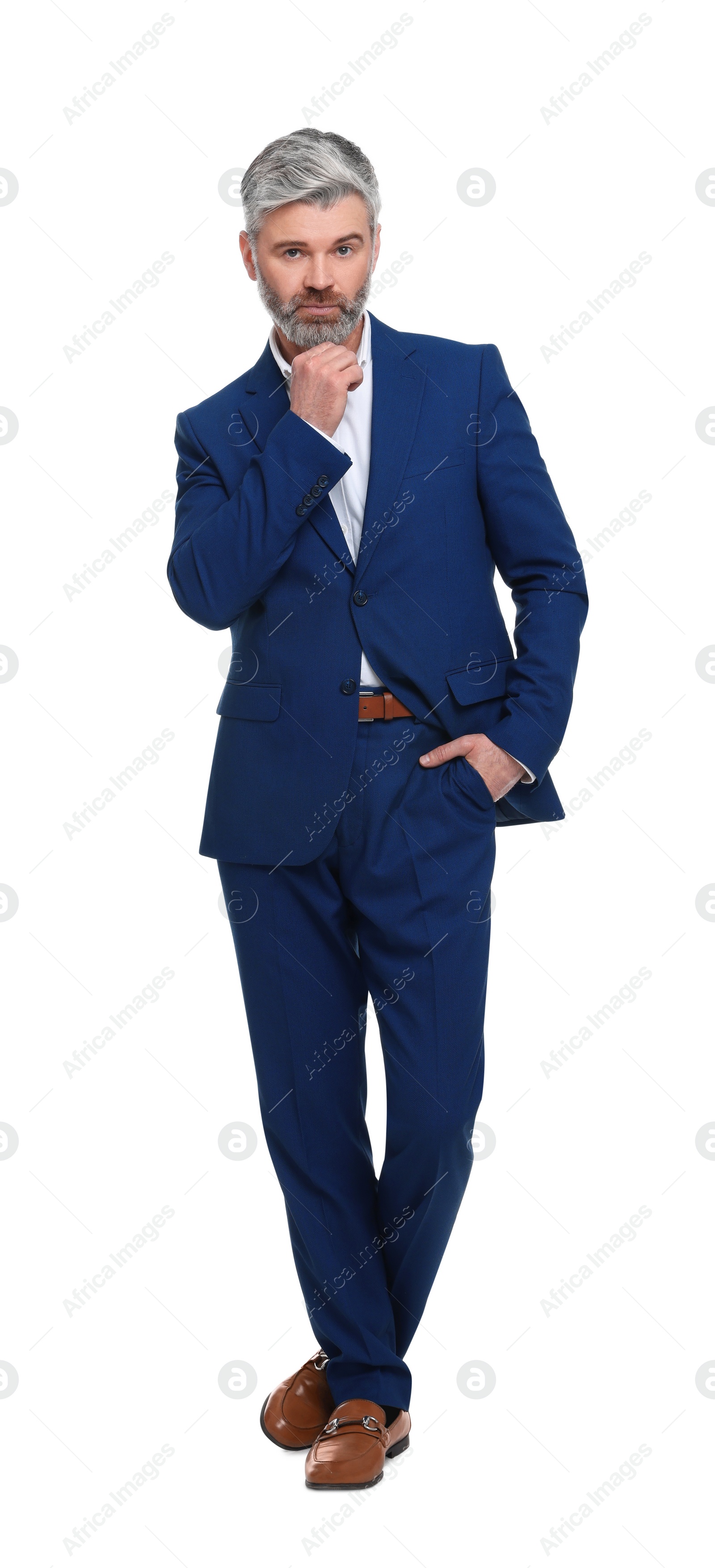 Photo of Mature businessman in stylish clothes posing on white background