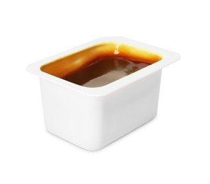 Photo of Tasty barbecue sauce in plastic container isolated on white