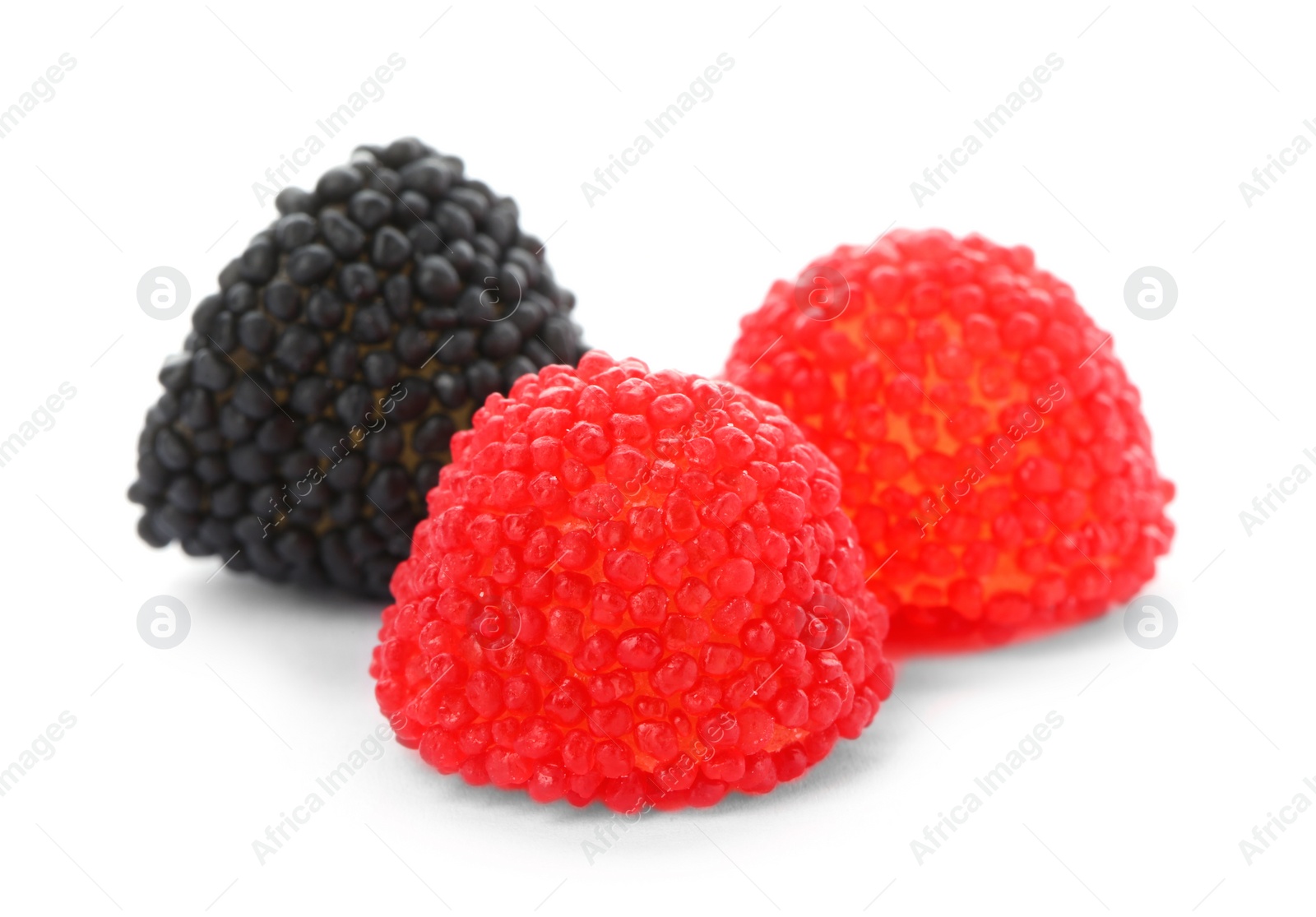 Photo of Delicious colorful chewing candies on white background