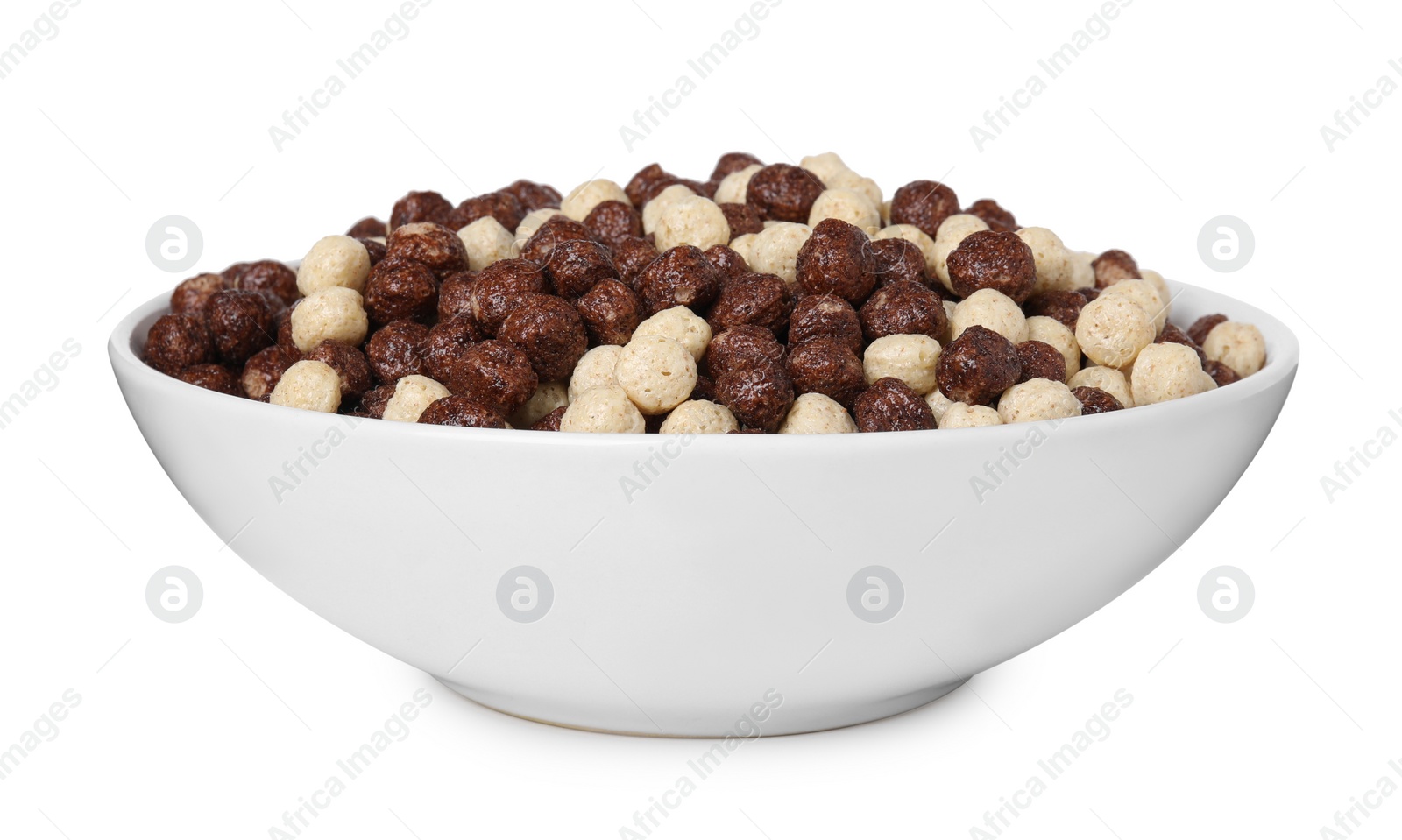 Photo of Tasty sweet cereal balls in bowl isolated on white