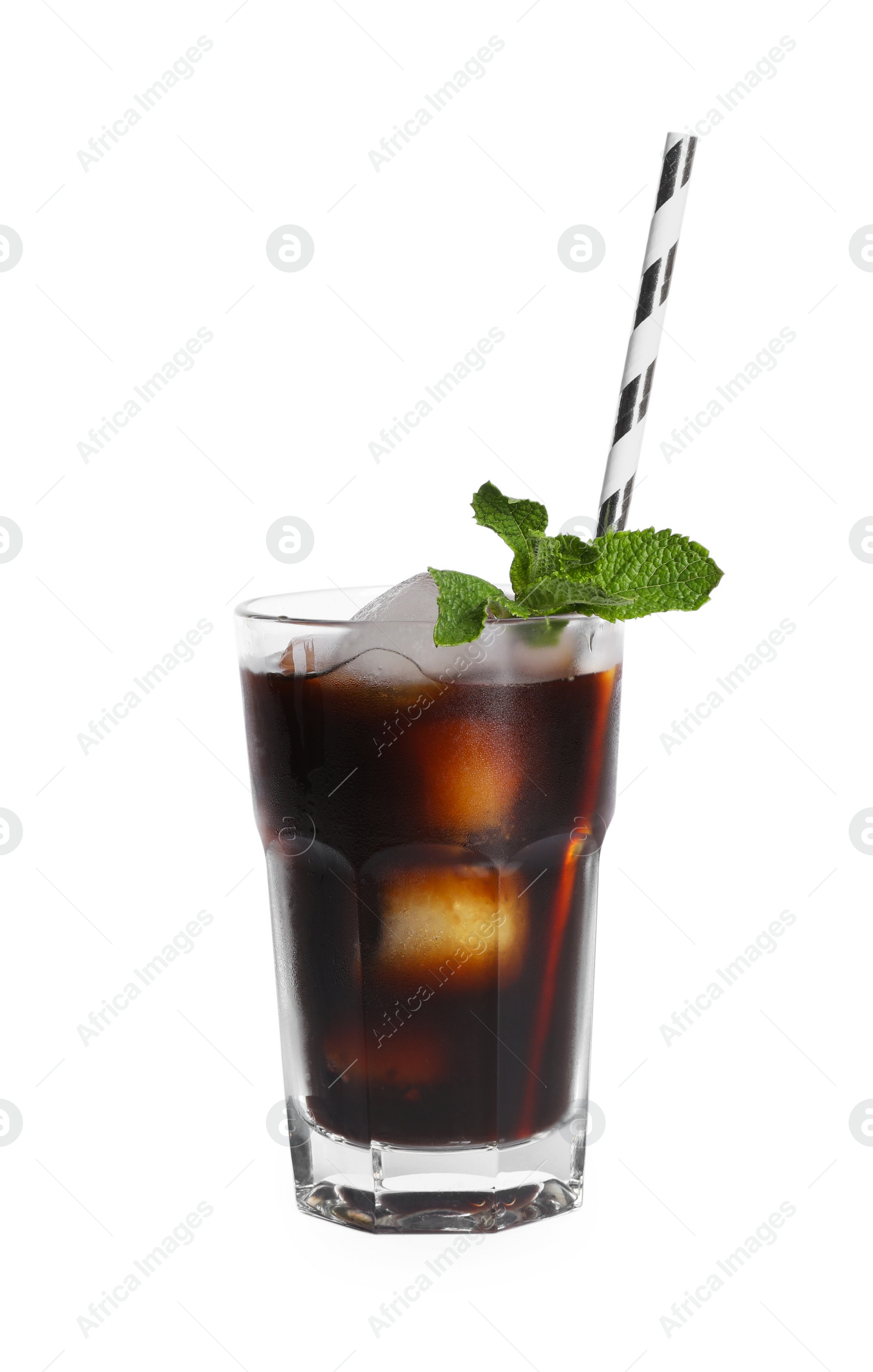 Photo of Refreshing iced coffee in glass with straw and mint leaves isolated on white