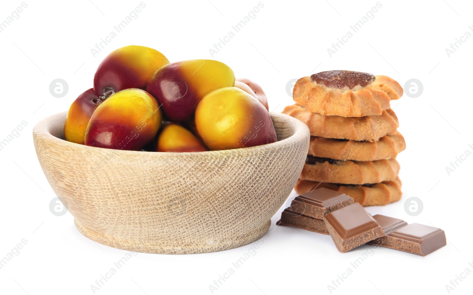 Image of Fresh ripe palm oil fruits and sweets on white background