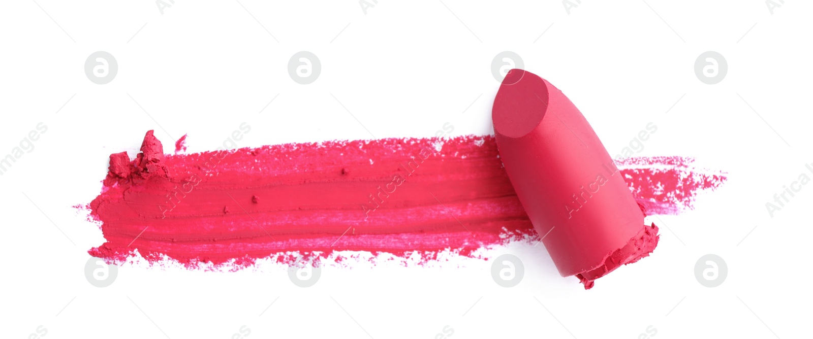 Photo of Lipstick and swatch on white background, top view