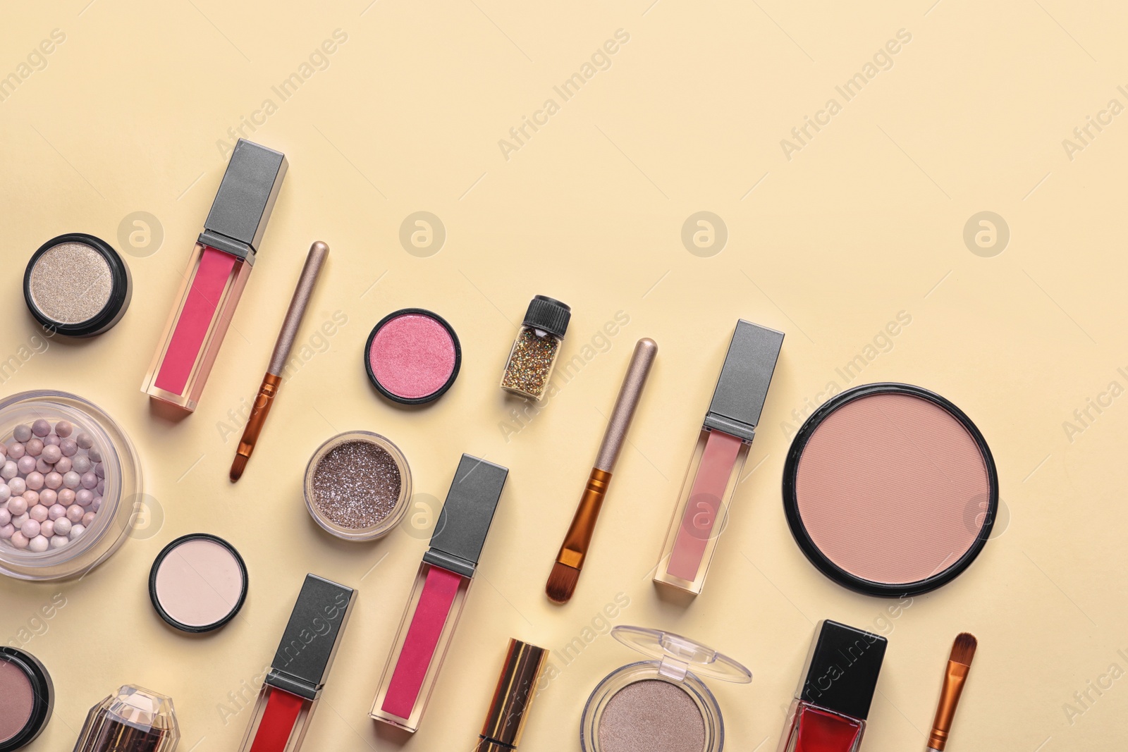 Photo of Beautiful composition with lipsticks on color background, flat lay