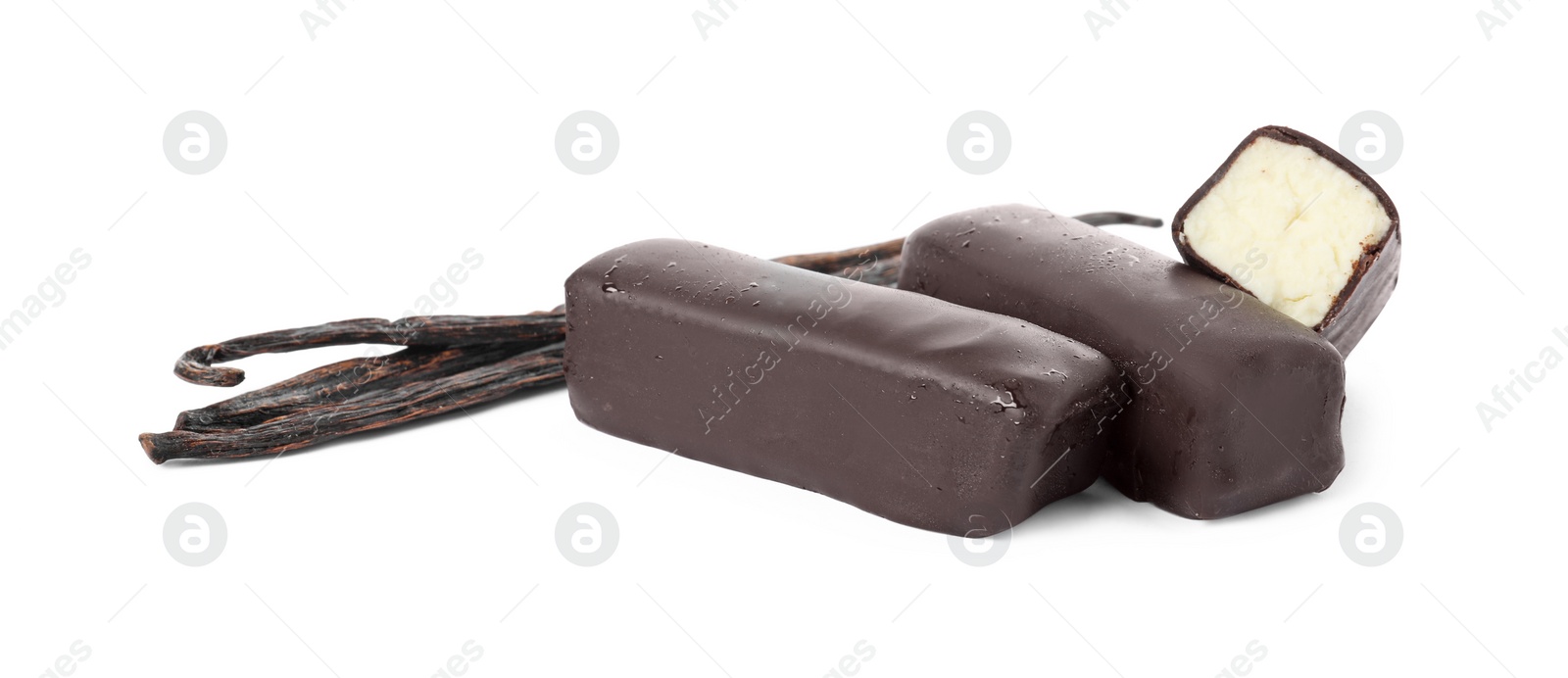 Photo of Glazed curd cheese bars and vanilla pods isolated on white