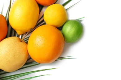 Photo of Set of fresh tropical fruits on white background