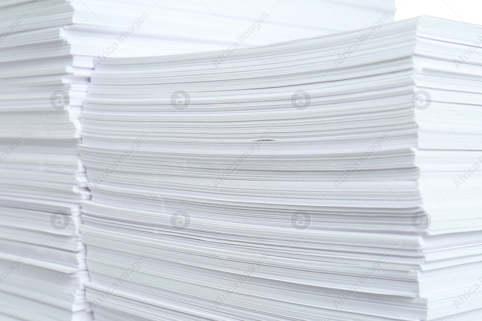 Photo of Stacks of white paper sheets, closeup view