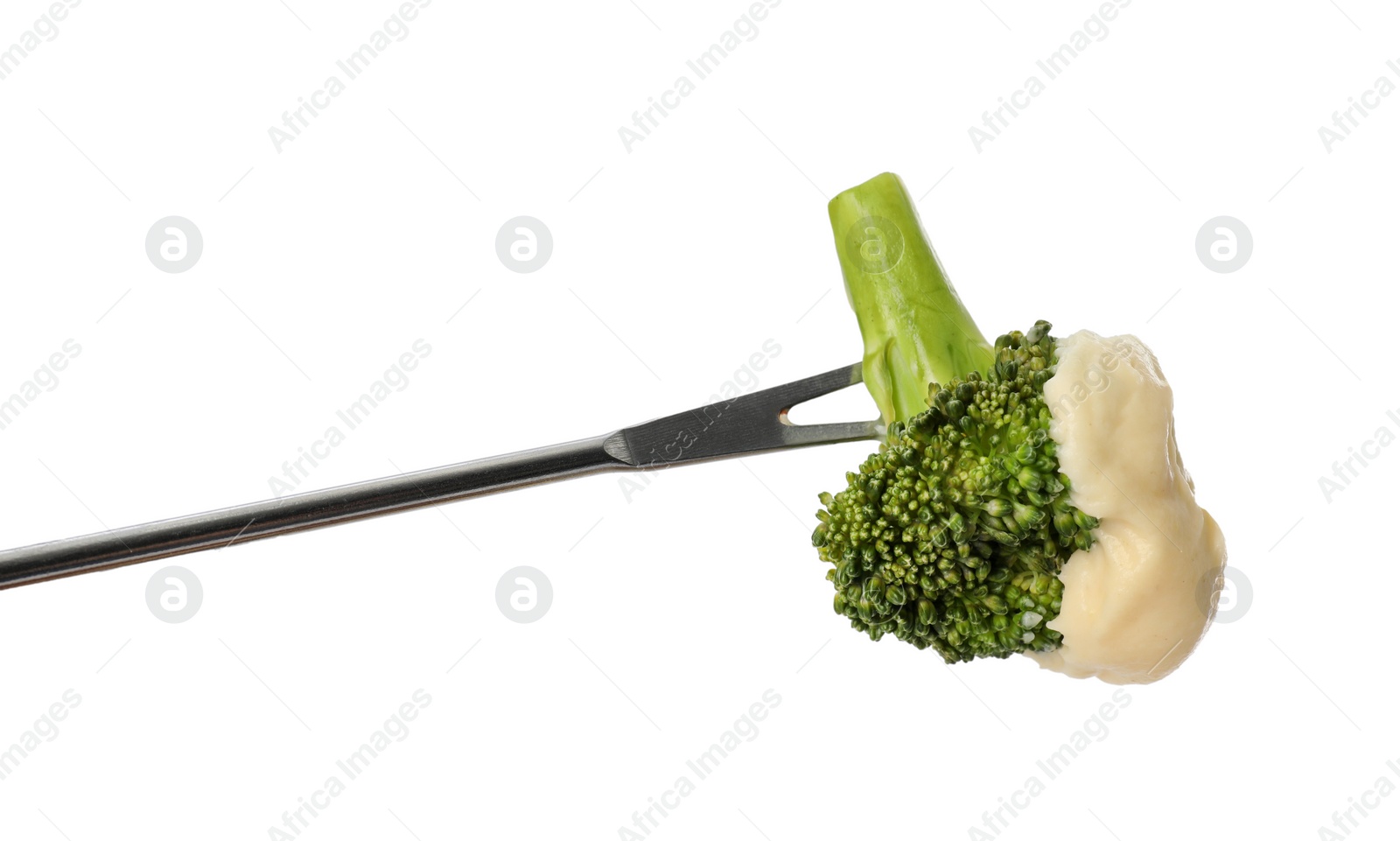 Photo of Tasty fondue. Fork with broccoli and melted cheese isolated on white